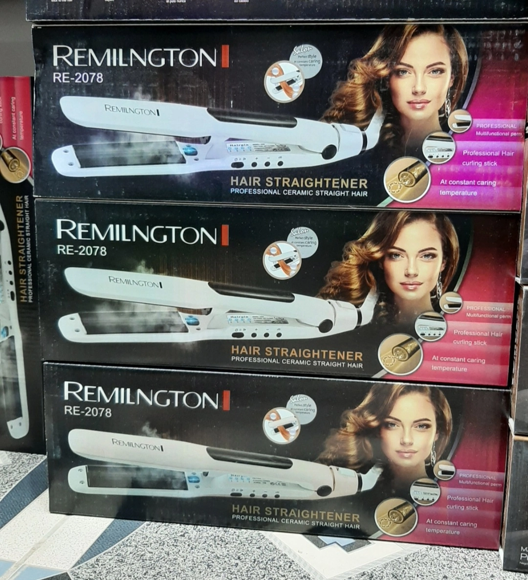 اتو مو بخاردار برند رمینگتون Remilngton RE-2078 Remilngton RE-2078 Steam Hair Straightener ویژگی های محصول  جنس صفحه: سرامیک  حداکثر دما: 240 درجه سانتی گراد  مدت زمان گرم شدن: 30 ثانیه